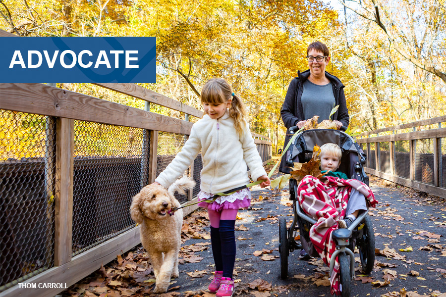 Advocate graphic over photo of Pennypack Trail | Photo by Thom Carroll