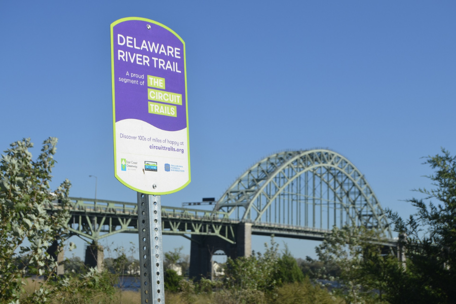 Purple wayfinding sign on the Delaware River Trail